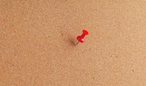 Natural brown cork texture background with red pin button and copy space Stock Photos