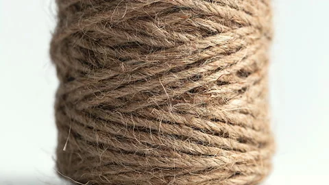 Natural Brown Jute Burlap Rustic Twine String Rope Cord Decor Stock Footage 137329805