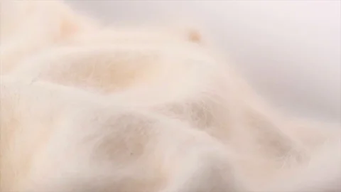 Natural Cashmere Soft and fluffy merino wool macro shot. Slow motion Stock Footage