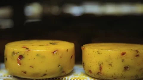 Natural cheese with spices Stock Footage 68940197