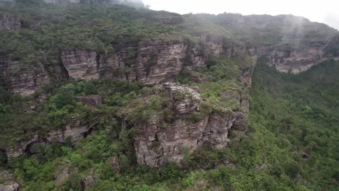 Natural Cliffs and Forest with Clouds in a Mountainous Landscape Aerial 스톡 동영상 332726961