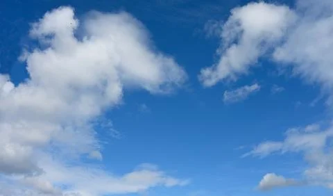 Natural Cloudscape in Blue Sky for Active Lifestyle and Relaxation Concepts Stock Photos