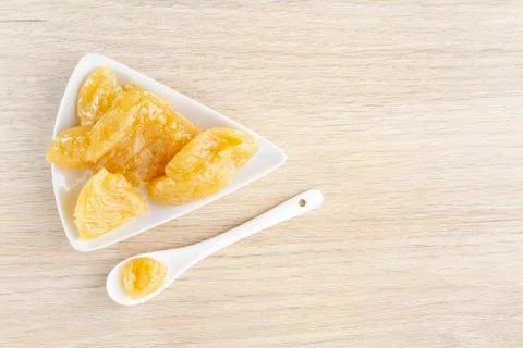 Natural collagen in solid state, in container on the table Stock Photos