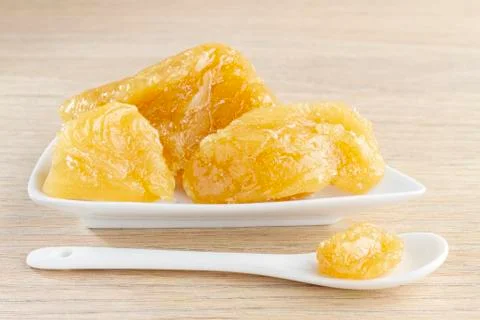 Natural collagen in solid state, in container on the table Stock Photos