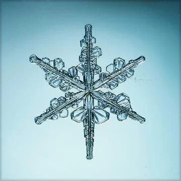 Natural crystal snowflake macro Stock Photos