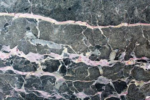 Natural of dark gray marble pattern for design. Stock Photos