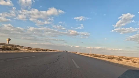 Natural desert road scenery during steady drive Cairo Fayoum Desert Road Stock Footage 330115062