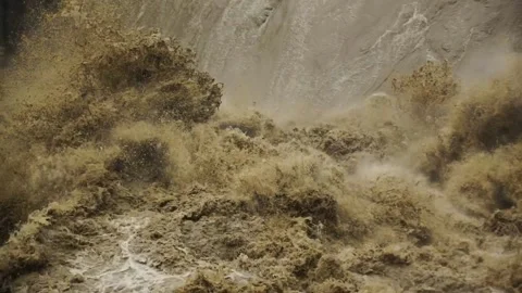 Natural disaster . Fast flowing raging river. Soil and mud is moving towards d Stock Footage