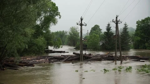 Natural disaster . Fast flowing raging river. Soil and mud is moving towards dow Stock Footage 133636725