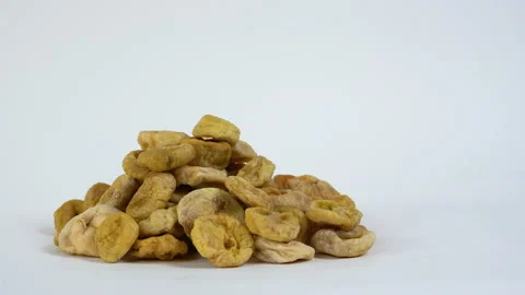 Natural dried figs on white background. Video stock 146648723