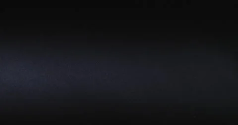 Natural Dust Organic Floating particles in stage light ray spot on black Stock Footage 133386259