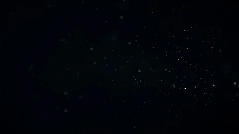 Natural Dust Particles Float On Black Background. Dust In Motion. Stock Footage 90225680