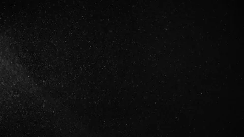 Natural Dust Particles Float On Black Background. Dust In Motion. Stock Footage 104517399