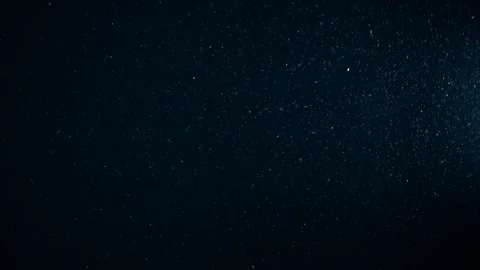 Natural Dust Particles Float On Black Background. Dust In Motion. Stock Footage 119996256