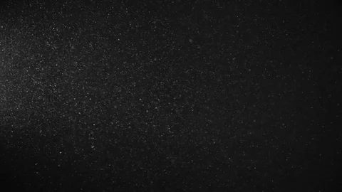 Natural Dust Particles Float On Black Background. Dust In Motion. Stock Footage 119998909