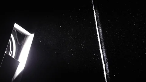 Natural dust particles float on black background. Vídeo Stock 125029734