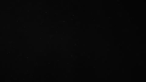 Natural Dust Particles Float On Black Background. Dust In Motion. Stock Footage 247322906