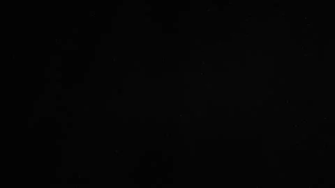 Natural Dust Particles Float On Black Background. Dust In Motion. Stock Footage 247323241