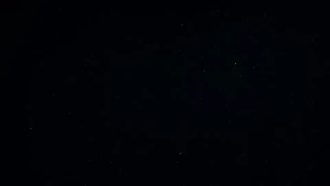 Natural Dust Particles Float On Black Background. Dust In Motion. Stock Footage 247581255