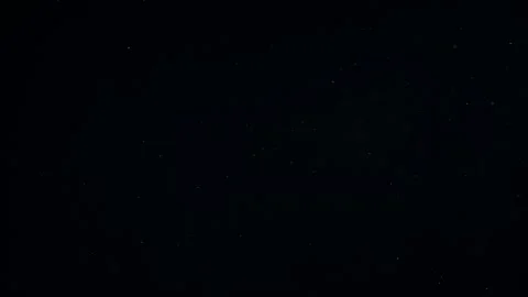 Natural Dust Particles Float On Black Background. Dust In Motion. Stock Footage 247581506