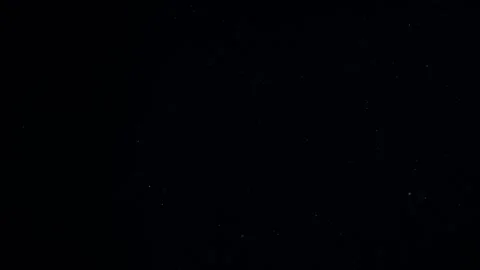 Natural Dust Particles Float On Black Background. Dust In Motion. Stock Footage 247581581