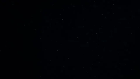 Natural Dust Particles Float On Black Background. Dust In Motion. Stock Footage 247581981