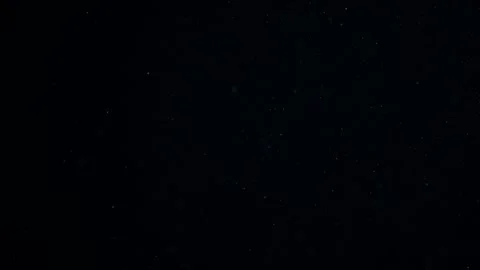 Natural Dust Particles Float On Black Background. Dust In Motion. Stock Footage 247582113