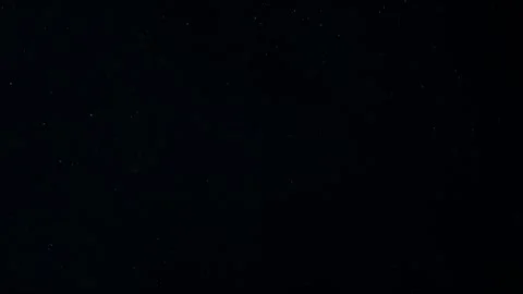 Natural Dust Particles Float On Black Background. Dust In Motion. Stock Footage 247585226