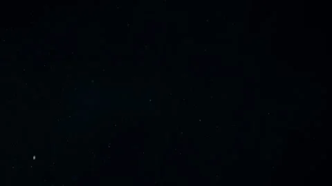 Natural Dust Particles Float On Black Background. Dust In Motion. Stock Footage 247585247