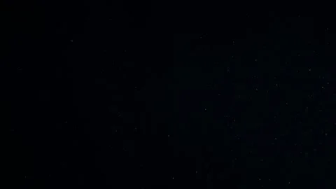 Natural Dust Particles Float On Black Background. Dust In Motion. Stock Footage 247585342