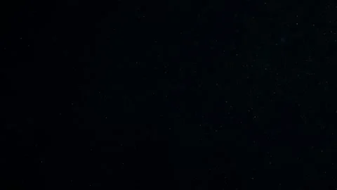 Natural Dust Particles Float On Black Background. Dust In Motion. Stock Footage 247585404