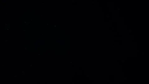 Natural Dust Particles Float On Black Background. Dust In Motion. Stock Footage 247585793