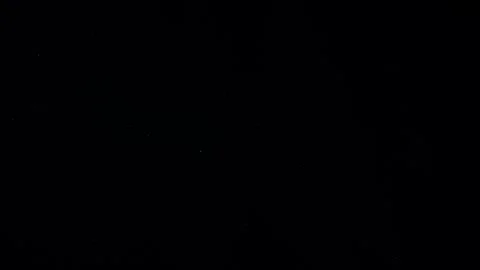 Natural Dust Particles Float On Black Background. Dust In Motion. Stock Footage 247585975