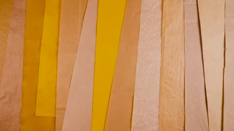 Natural, eco-friendly paper background in warm tones.  Video stock 330264482