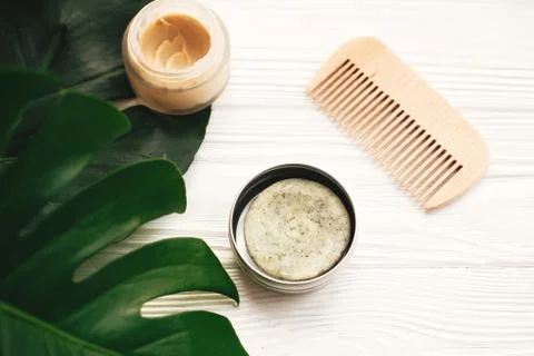 Natural eco friendly solid shampoo bar, wooden brush,  conditioner,soap, deod Stock Photos