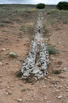 Natural erosion pattern in rocky terrain from Segobriga, Spain Stock Photos