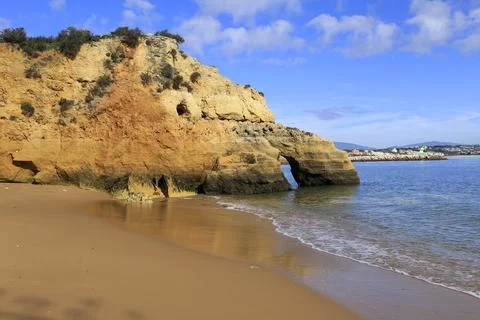 Natural features, cliffs and limestone formations in Praia da Batata Beach Stock Photos