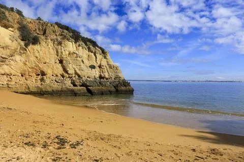 Natural features, cliffs and limestone formations in Praia da Batata Beach Stock Photos