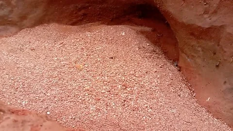 Natural formations of red soil such as river flow Stock Footage 223094620