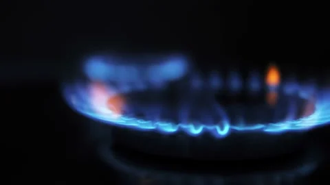Natural gas burning in kitchen stove. Concept of problems with gas in European Stock Footage 213617847