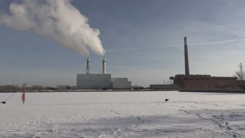 Natural gas electrical power generating plant spewing carbon into environment Stock Footage 148457108