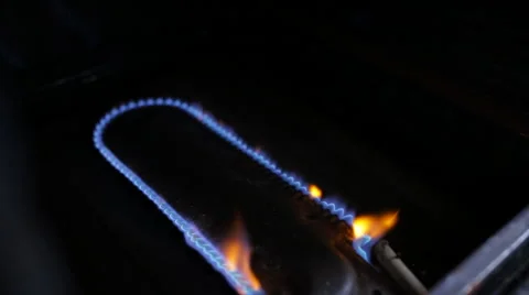 Natural gas inflammation in domestic oven, close up view Stock Footage