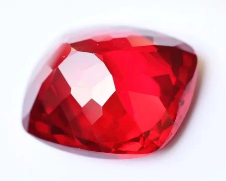 Natural gemstone red ruby on gray background Stock Photos