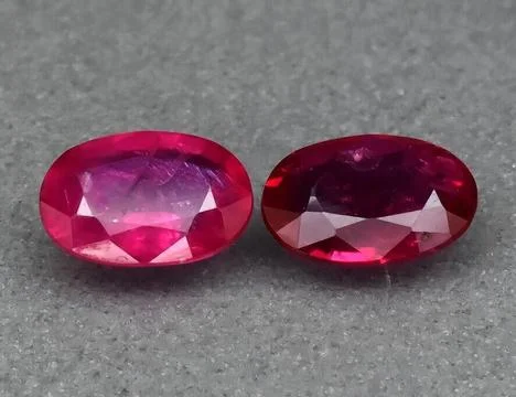 Natural gemstone red ruby on gray background Stock Photos