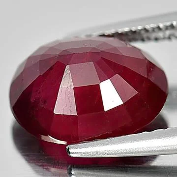 Natural gemstone red ruby on white background Stock Photos