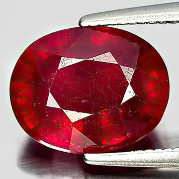 Natural gemstone red ruby on white background 스톡 사진
