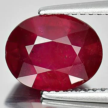Natural gemstone red ruby on white background Stock Photos