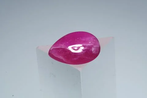 Natural gemstone ruby on a stand white background 스톡 사진