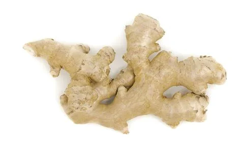 Natural ginger root displayed on bright white backdrop. Stock Photos