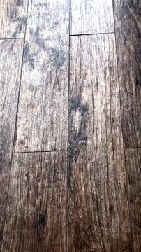 Natural grain and texture of rustic wooden flooring brings warmth and charm to Stock Photos